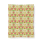 A rectangular fabric or paper sheet featuring a repeating vintage floral damask pattern in pink, green, yellow, and orange on a cream background, shown against a plain white backdrop.