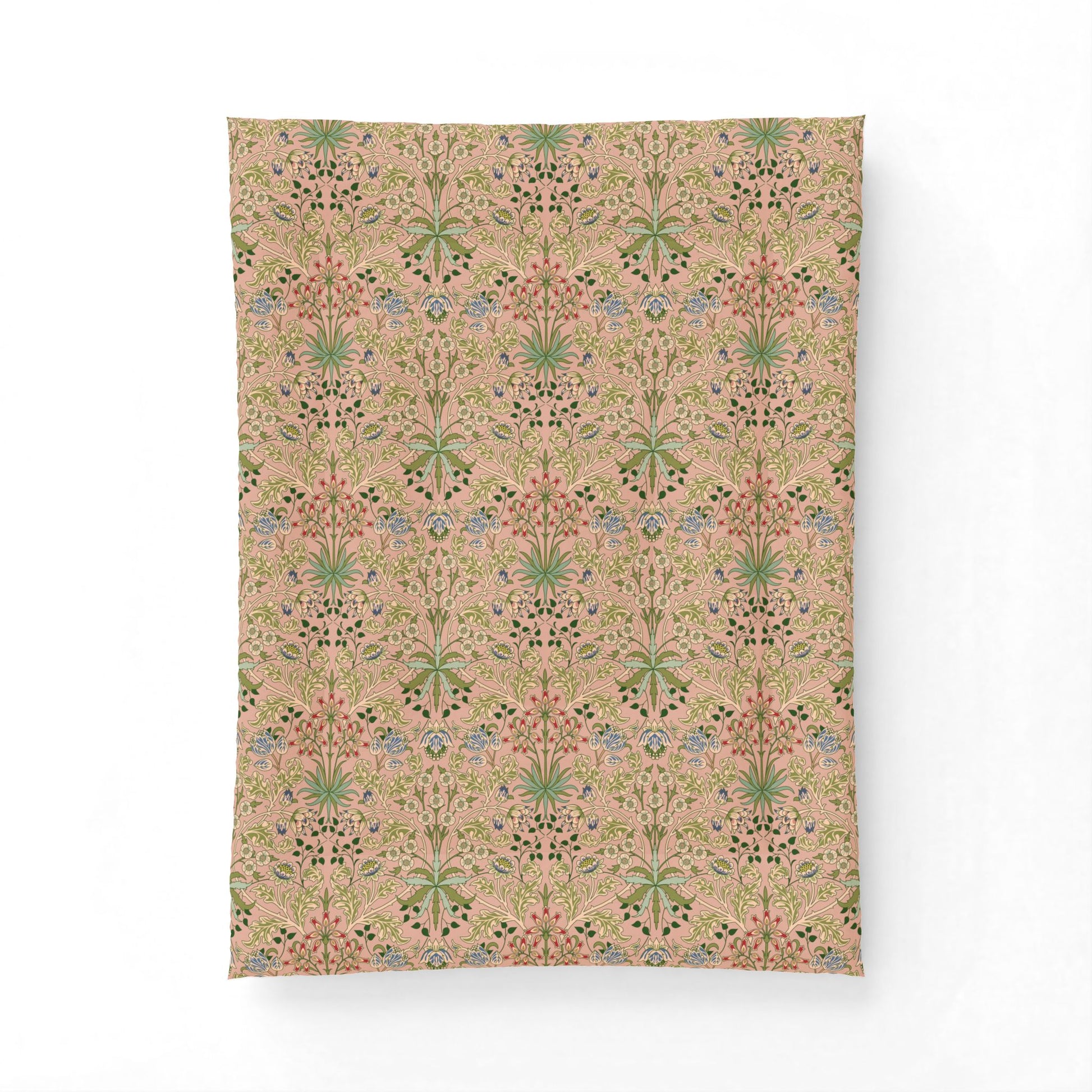 A rectangular fabric panel or pillow cover featuring a vintage botanical pattern in muted pink, green, and blue on a warm beige background, displayed against a clean white backdrop.