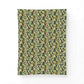 A rectangular textile or fabric panel with a dense repeating floral and botanical pattern in muted green, pink, brown, and cream, shown flat against a plain white background.