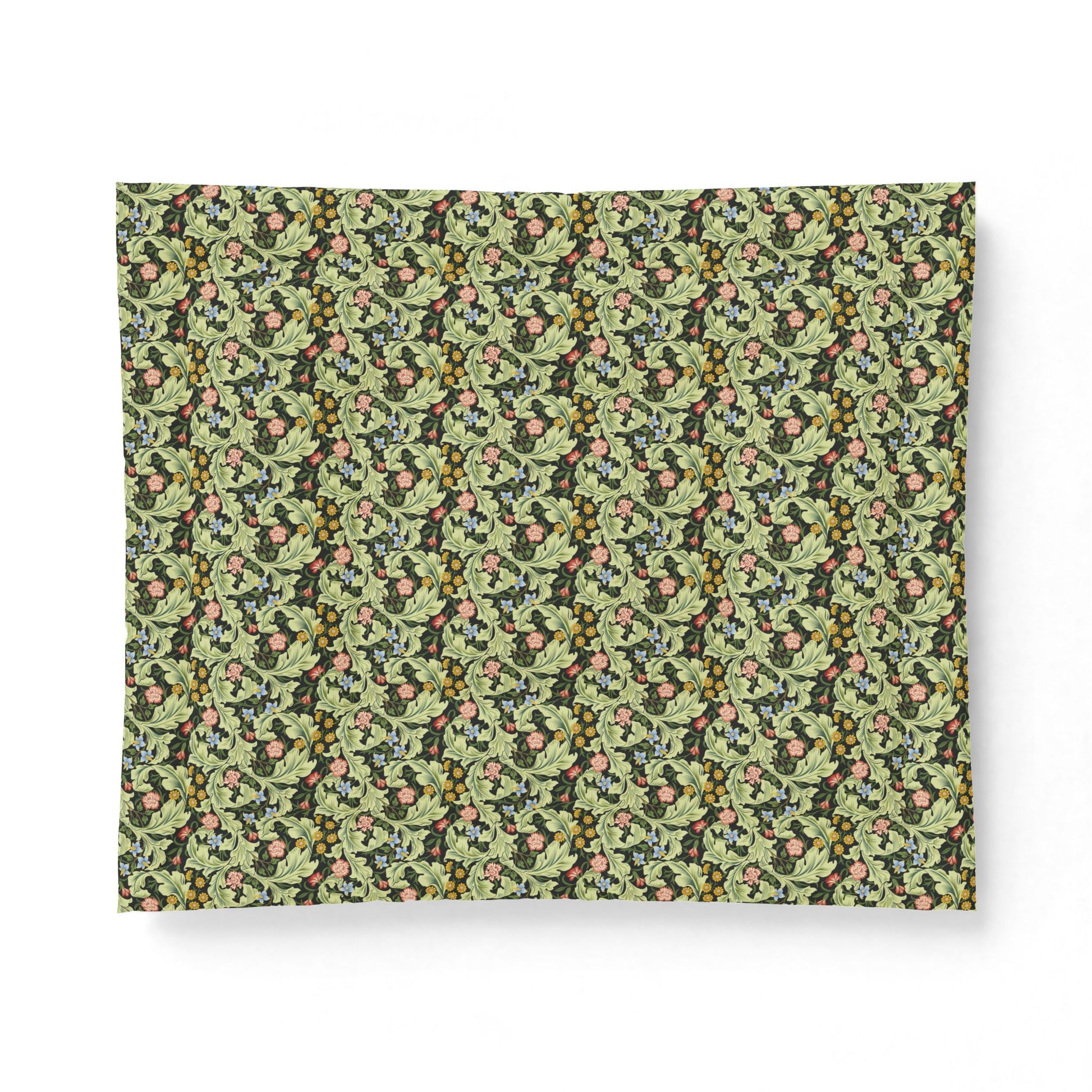 A rectangular fabric placemat featuring a dense, repeating botanical pattern of green leaves, pink berries, and dark accents on a light olive background, shown against a plain white background.