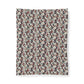 Floral patterned fabric swatch on a white background