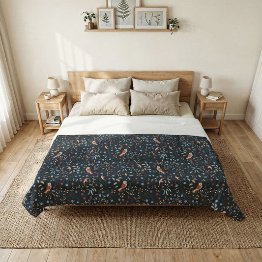 Cotton Comforter by William Morris & Co in a dark blue floral pattern called Newill Collection (Night)