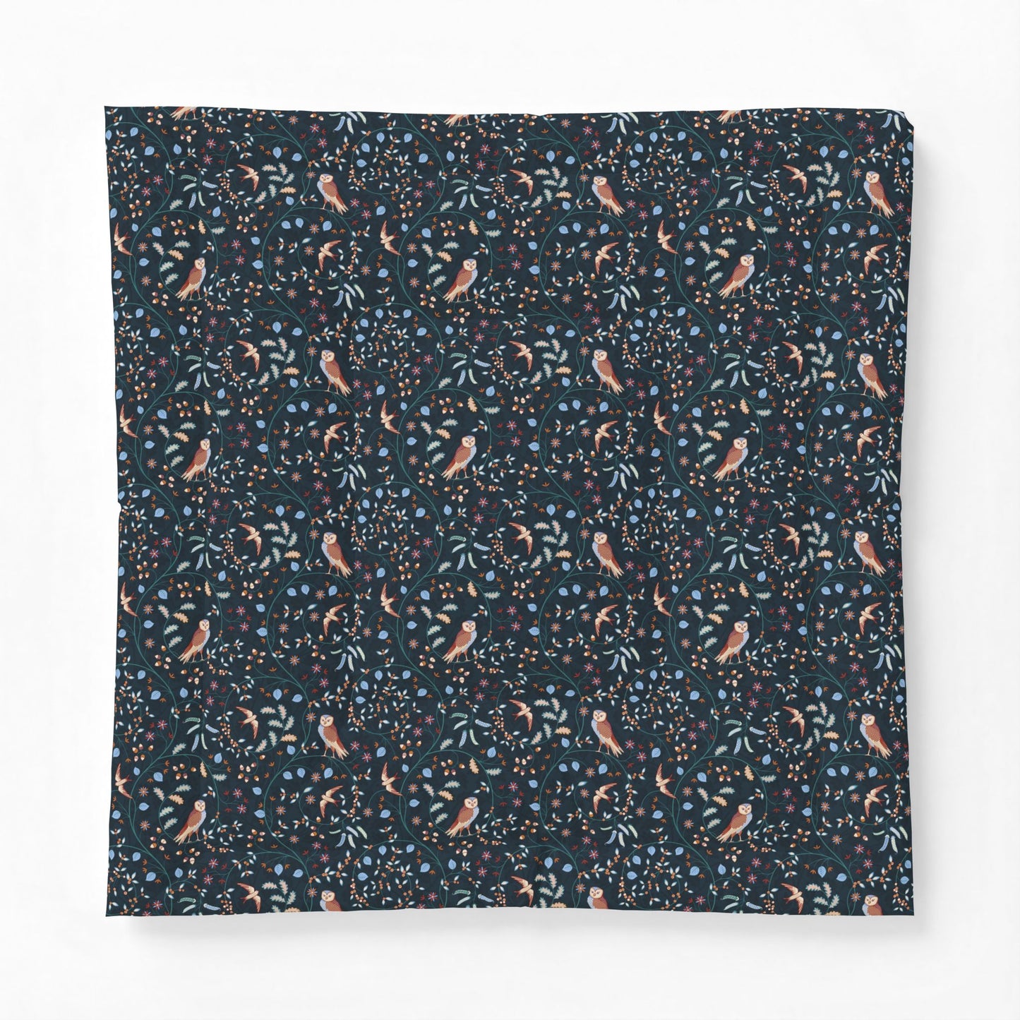 Cotton Comforter by William Morris & Co in a dark blue floral pattern called Newill Collection (Night)