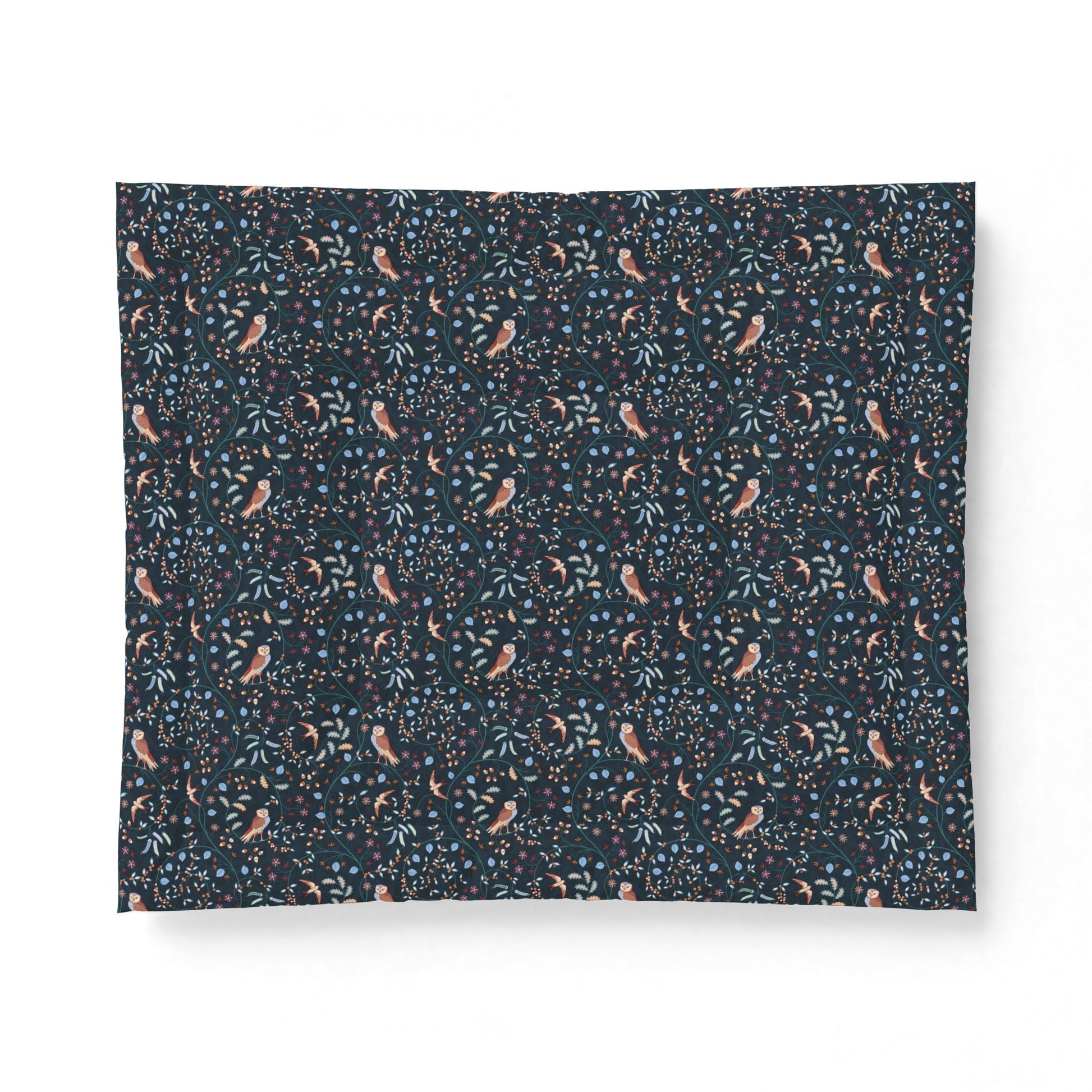 Cotton Comforter by William Morris & Co in a dark blue floral pattern called Newill Collection (Night)