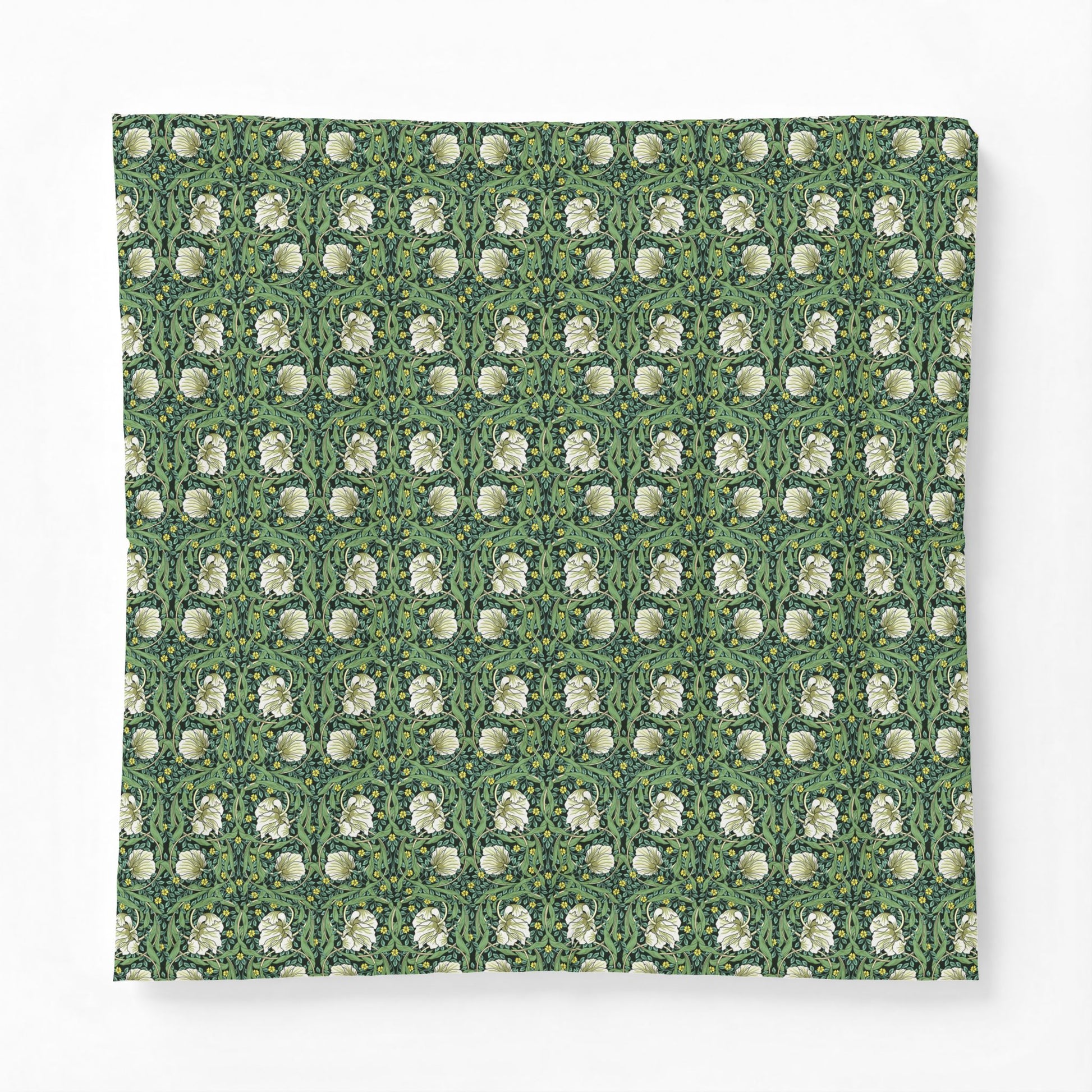 Patterned fabric with white floral design on a green background