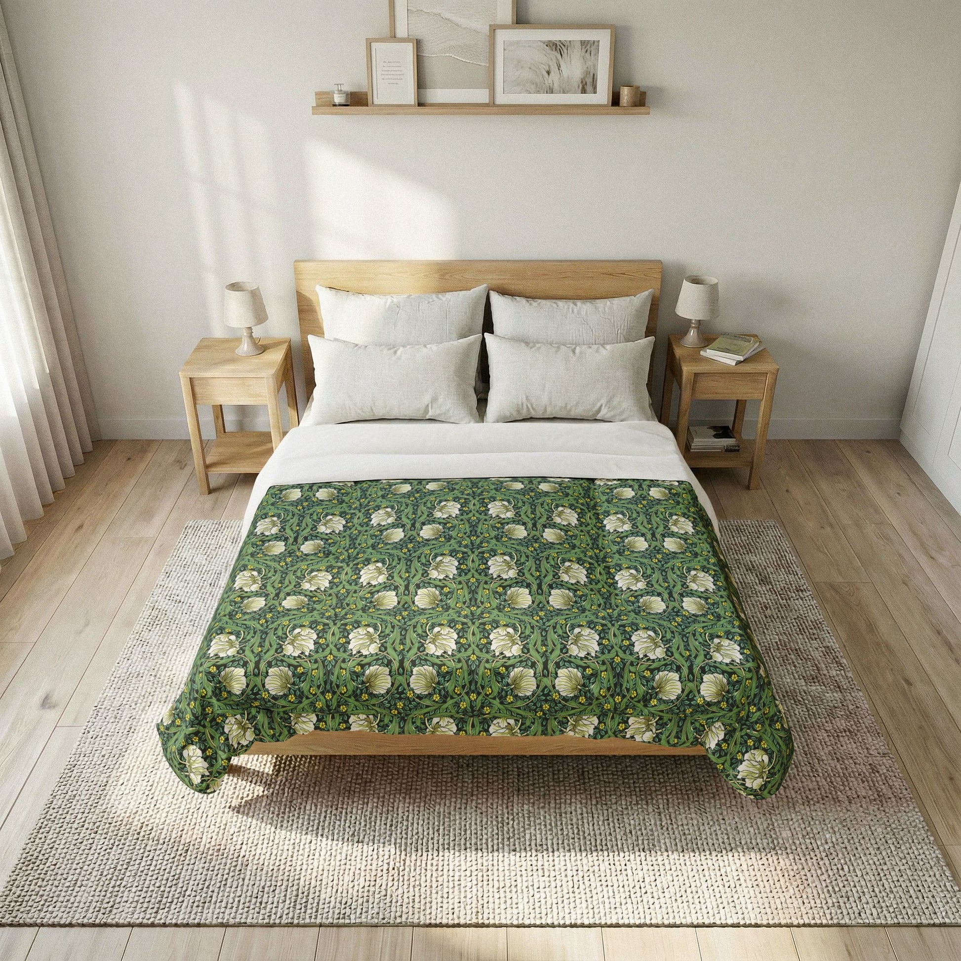 Bed with green floral patterned comforter in a bedroom setting