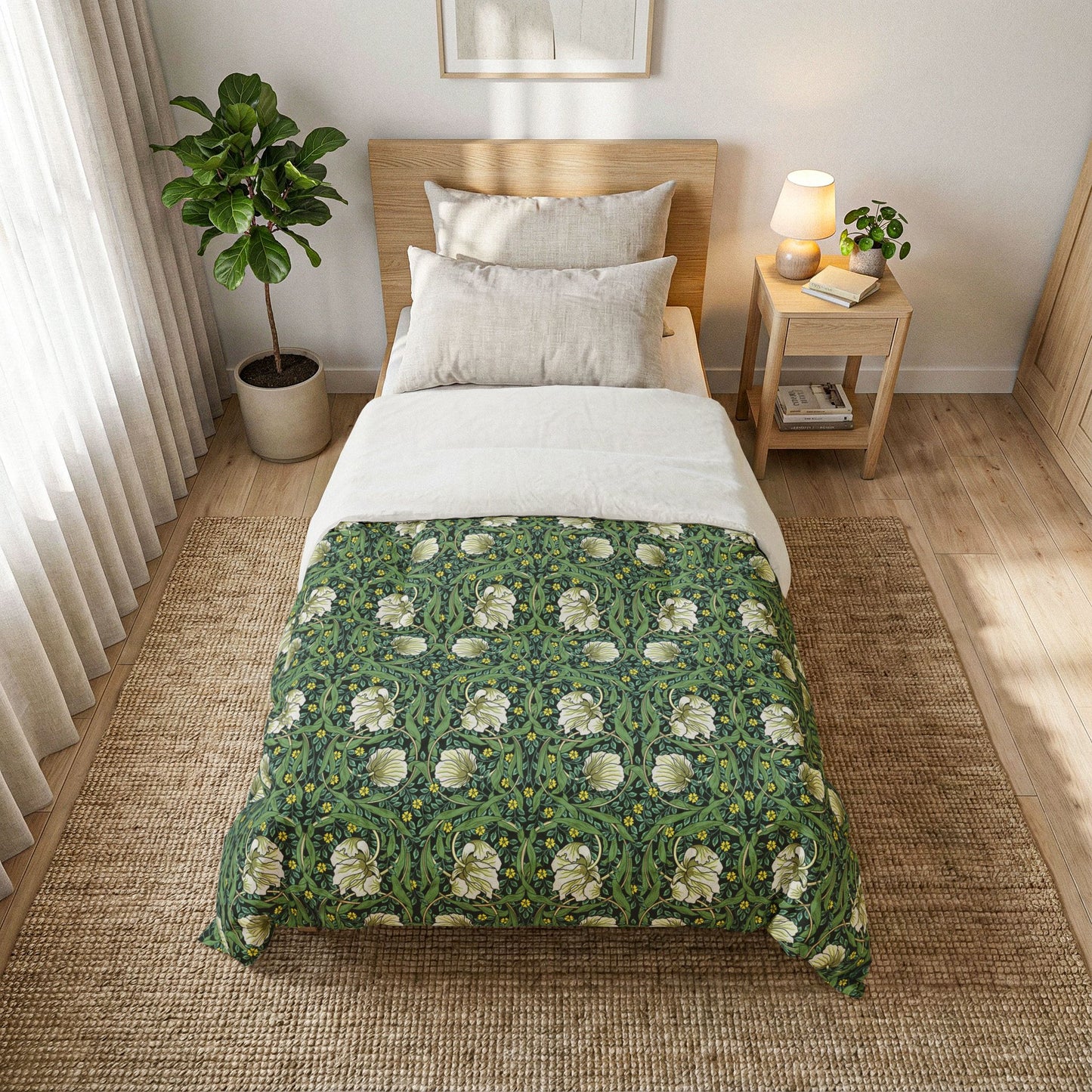 Bedroom with a bed featuring a green floral duvet cover, nightstand, and plant.