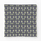 Patterned fabric with a blue and green design on a white background