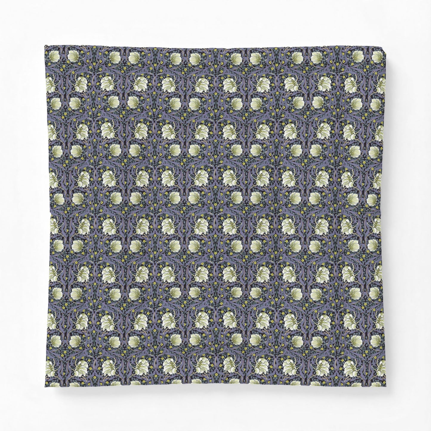 Patterned fabric with a blue and green design on a white background