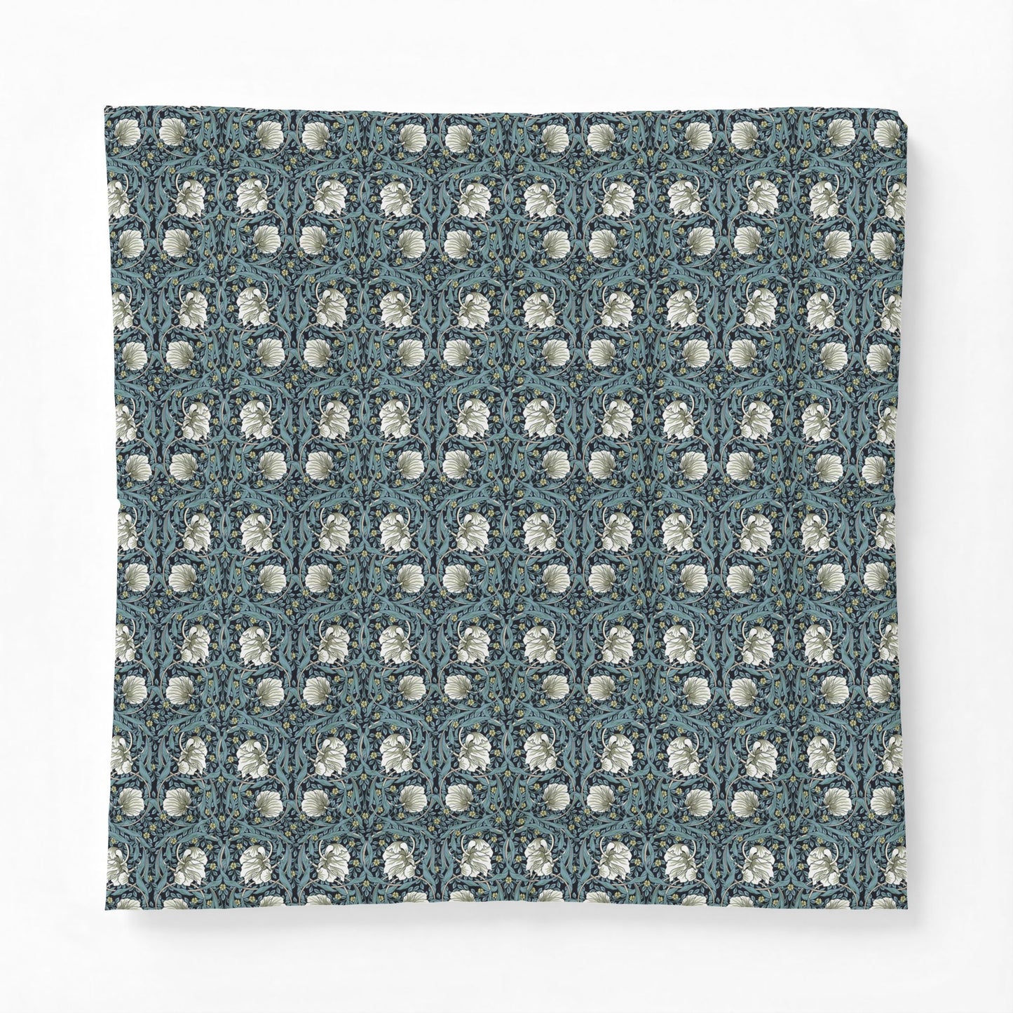 Patterned fabric with a blue and white design on a white background