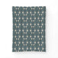 Patterned fabric swatch with floral design on a blue background
