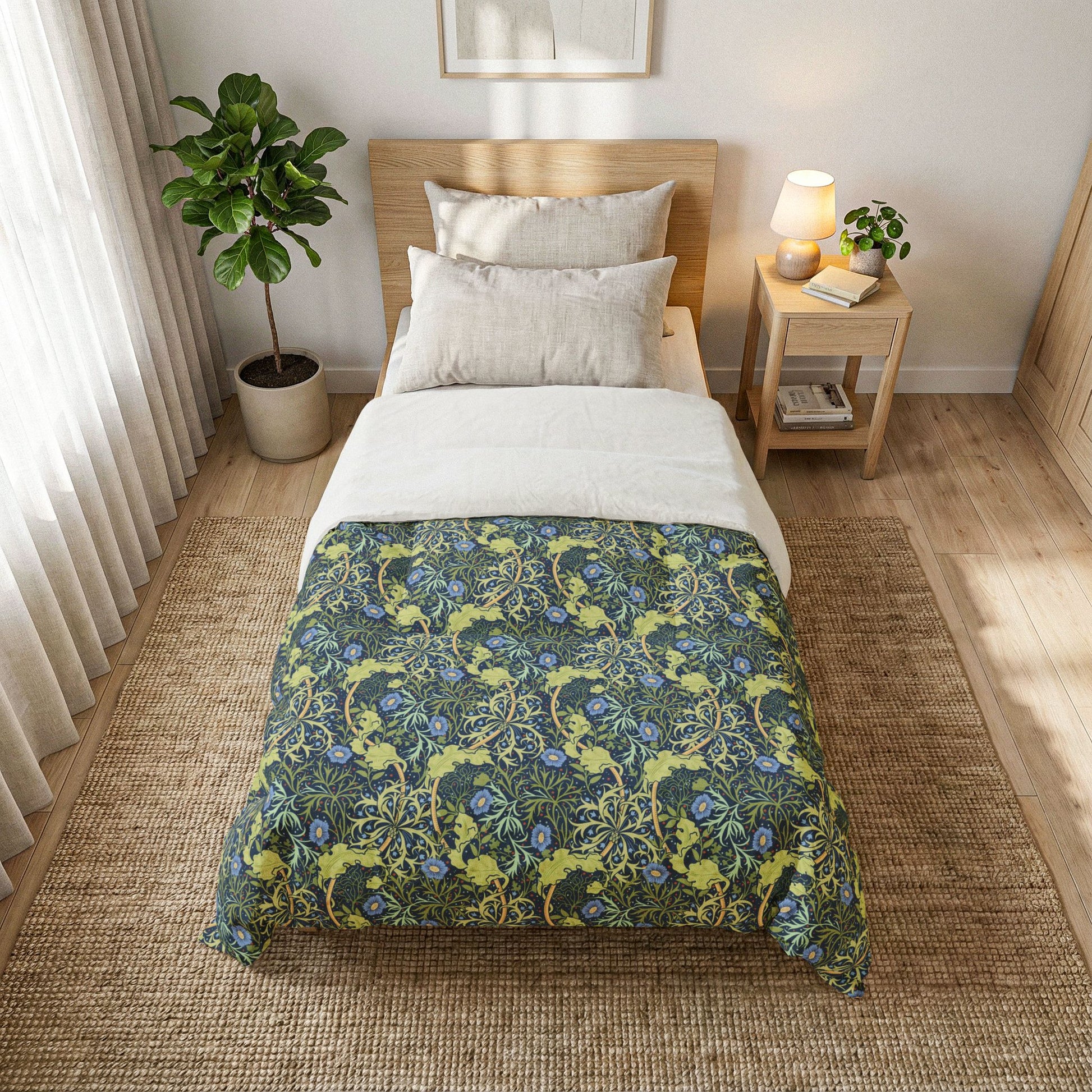 Bed with floral patterned comforter in a bright bedroom