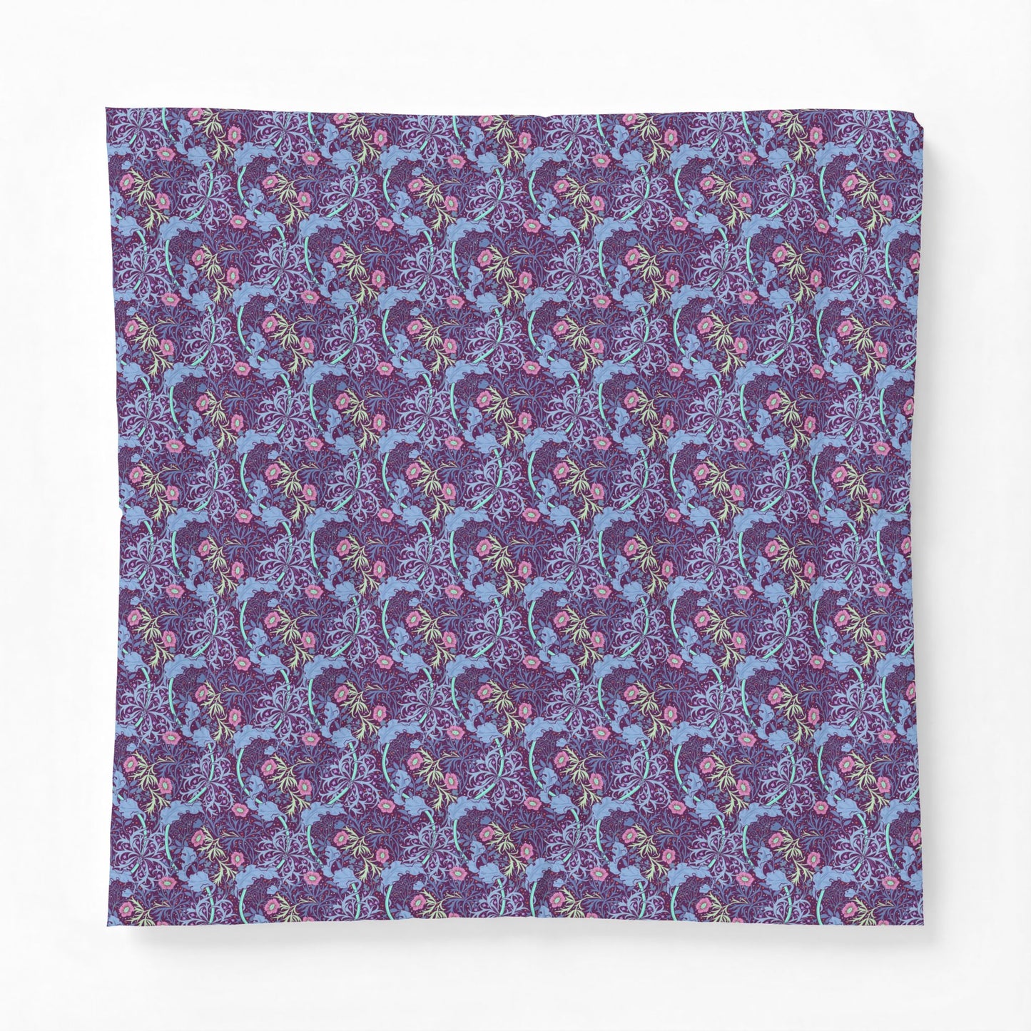 Patterned fabric with blue and pink design on a purple background
