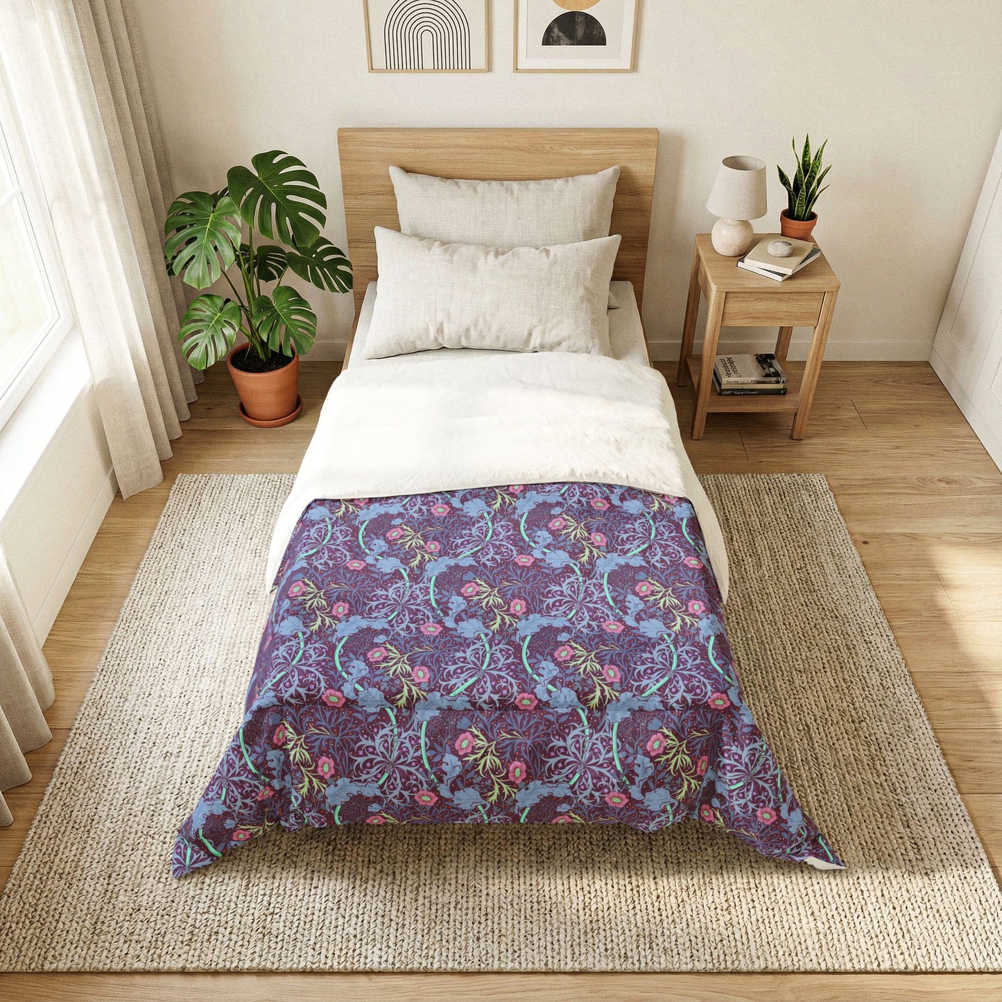 Bedroom with a bed featuring a purple floral patterned comforter.