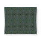 A square fabric or paper napkin featuring an intricate, symmetrical kaleidoscopic pattern in shades of teal, green, and muted pink, displayed flat against a clean white background.