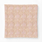Beige fabric with a subtle pattern on a white background