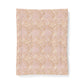Beige textured paper with a subtle pattern on a white background