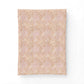 Beige patterned paper on a white background