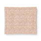 Beige textured paper with a subtle pattern on a white background