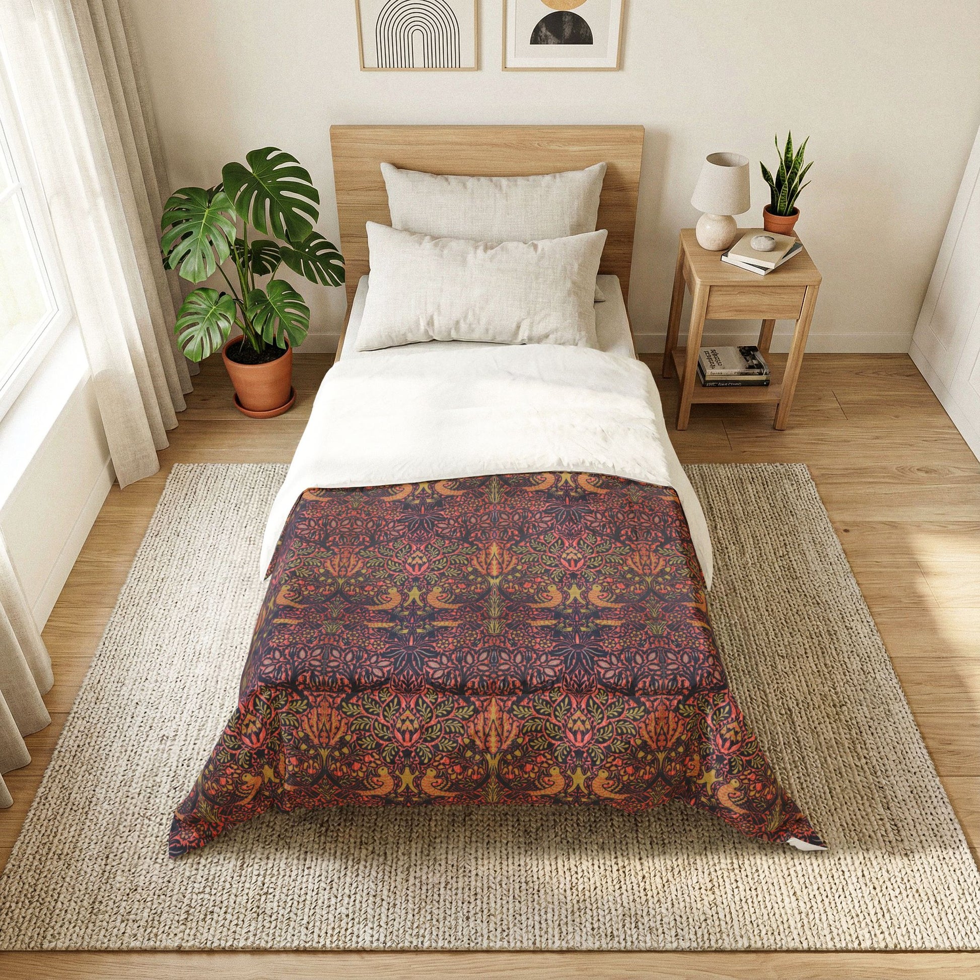 Bedroom with a bed featuring a green floral patterned duvet cover.
