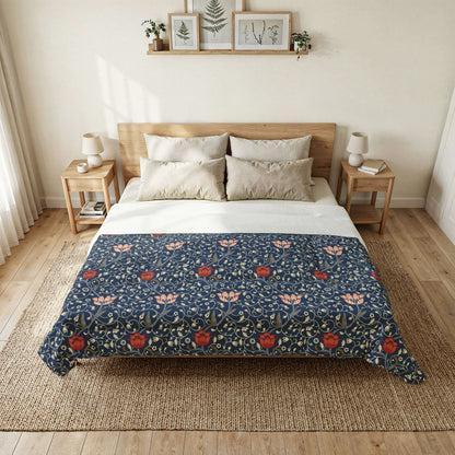 Bedroom with a bed featuring a floral patterned comforter, wooden headboard, and side tables.