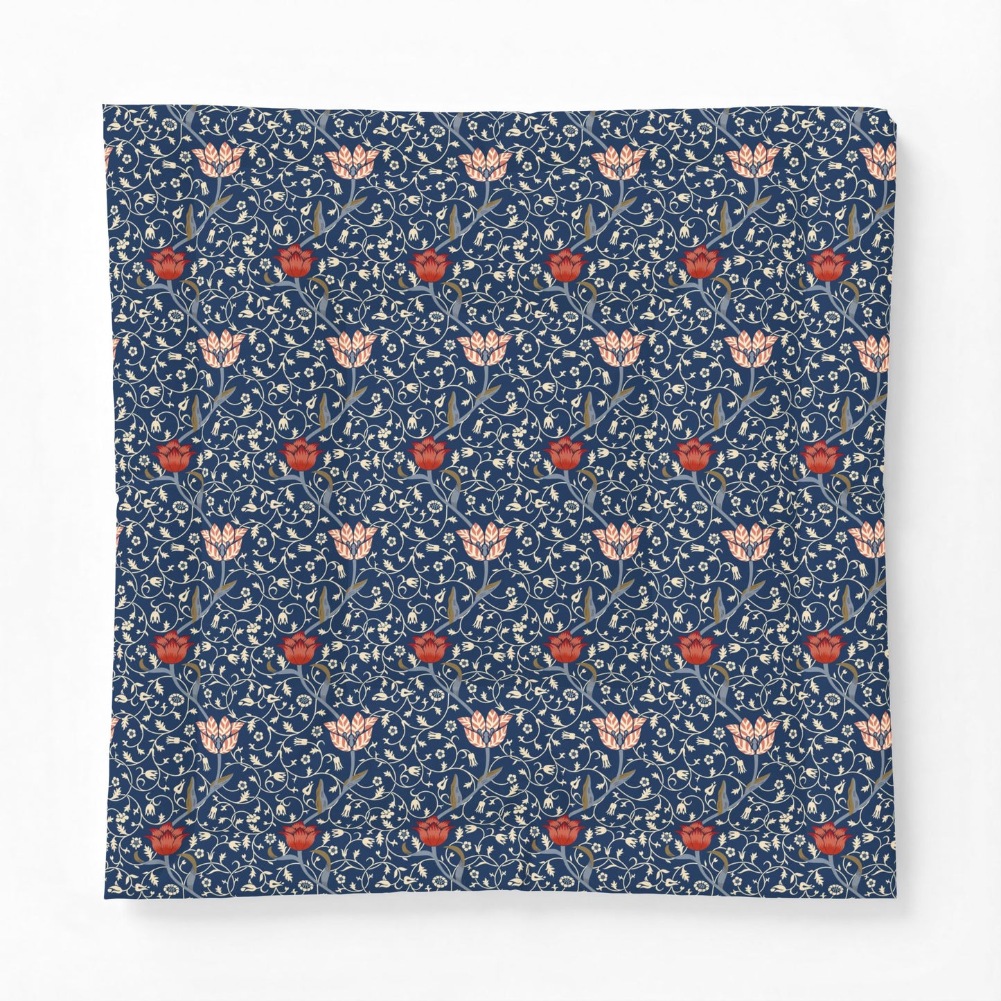 A square fabric item, likely a pillow cover or throw blanket, featuring a classic William Morris-style floral pattern in navy blue, cream, and red.