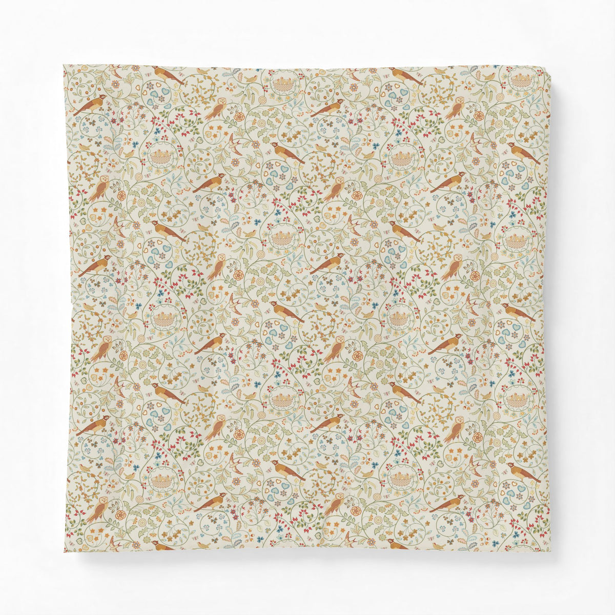 A square fabric cotton comforter featuring a dense, vintage-style botanical and bird pattern on a cream background, shown against a plain white studio background.