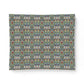 A square fabric or paper sheet with a dense, symmetrical floral and ornamental pattern in muted blue, green, beige, red, and white, shown against a plain white background.