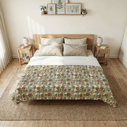 Bedroom with a bed featuring a patterned quilt and wooden headboard.