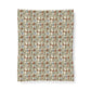 Patterned fabric swatch with geometric design on a white background