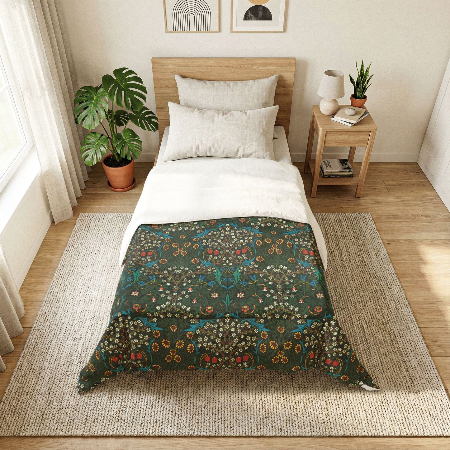 Bedroom with a bed featuring a blue wolf design comforter, nightstand with lamp and books, and plants.