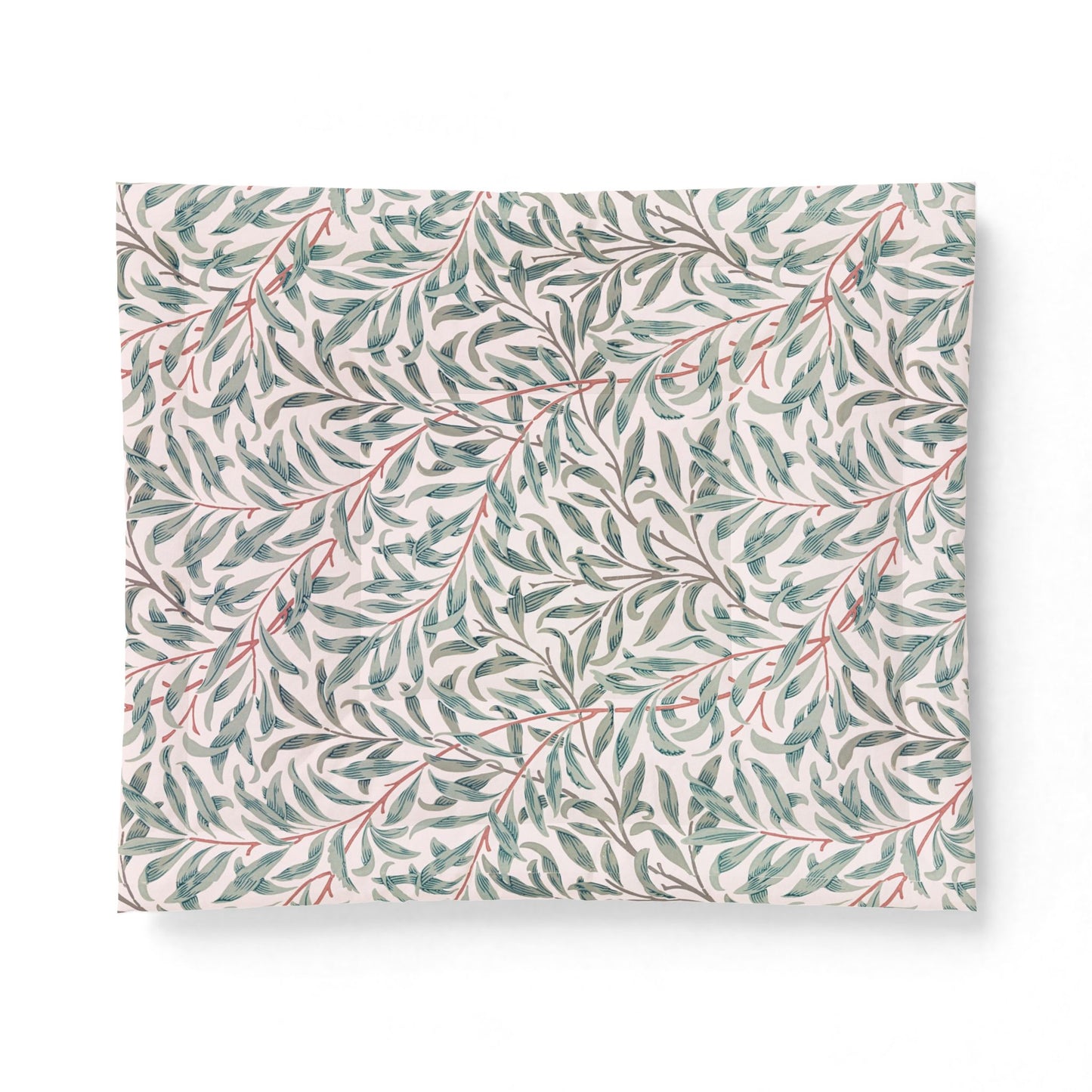 Floral patterned cotton comforter on a white background