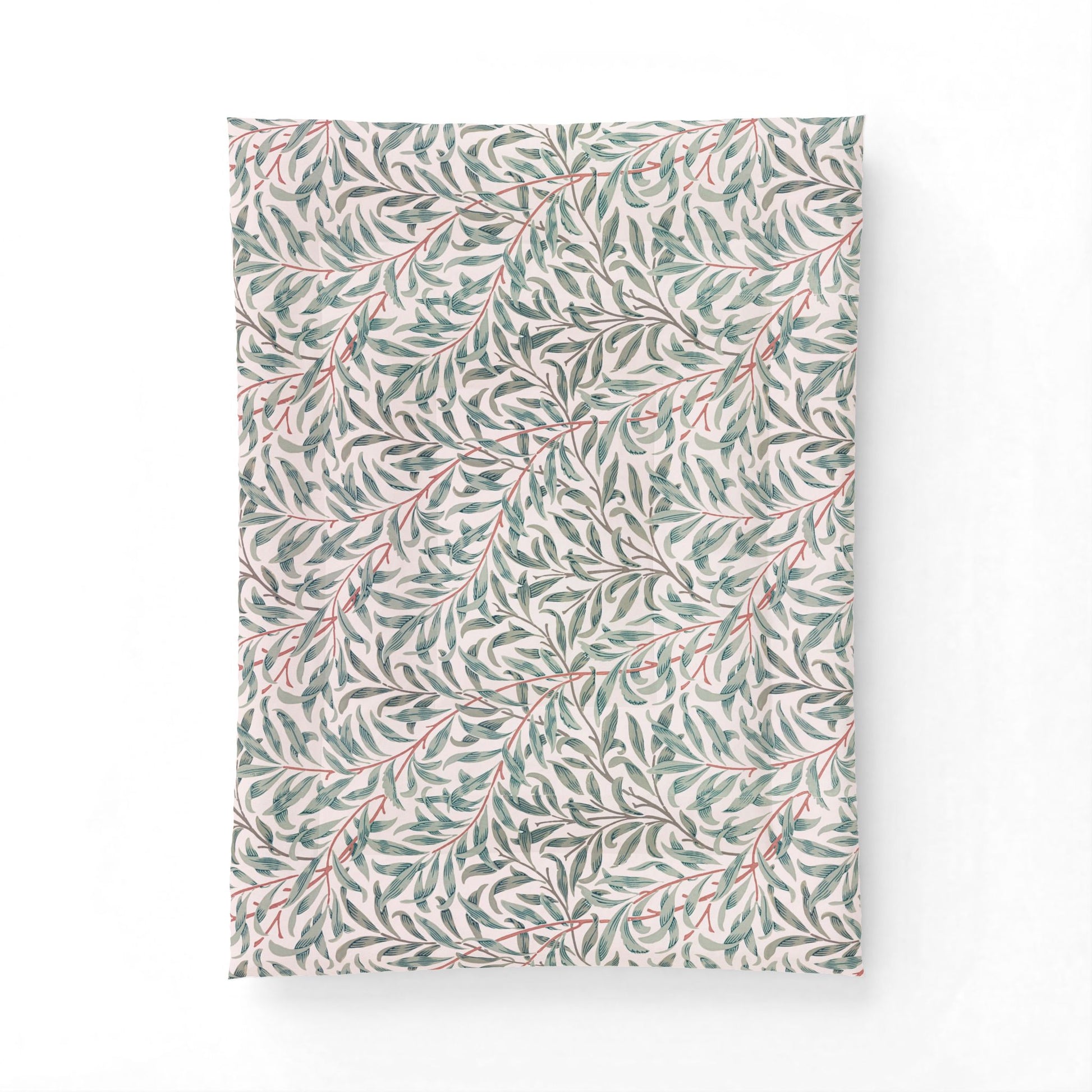 Cotton comforter with a leaf pattern on a white background