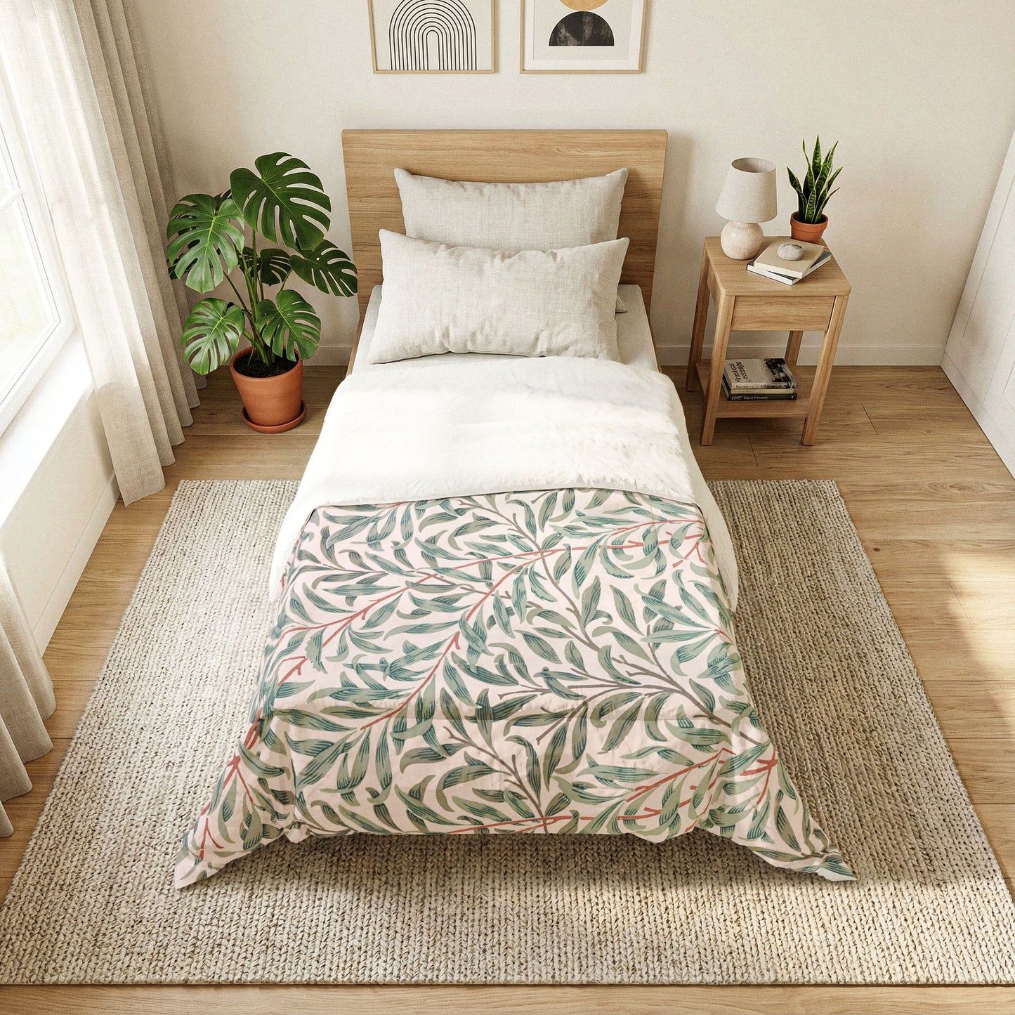 Bedroom with a bed featuring a leaf-patterned comforter, nightstand, and plants.