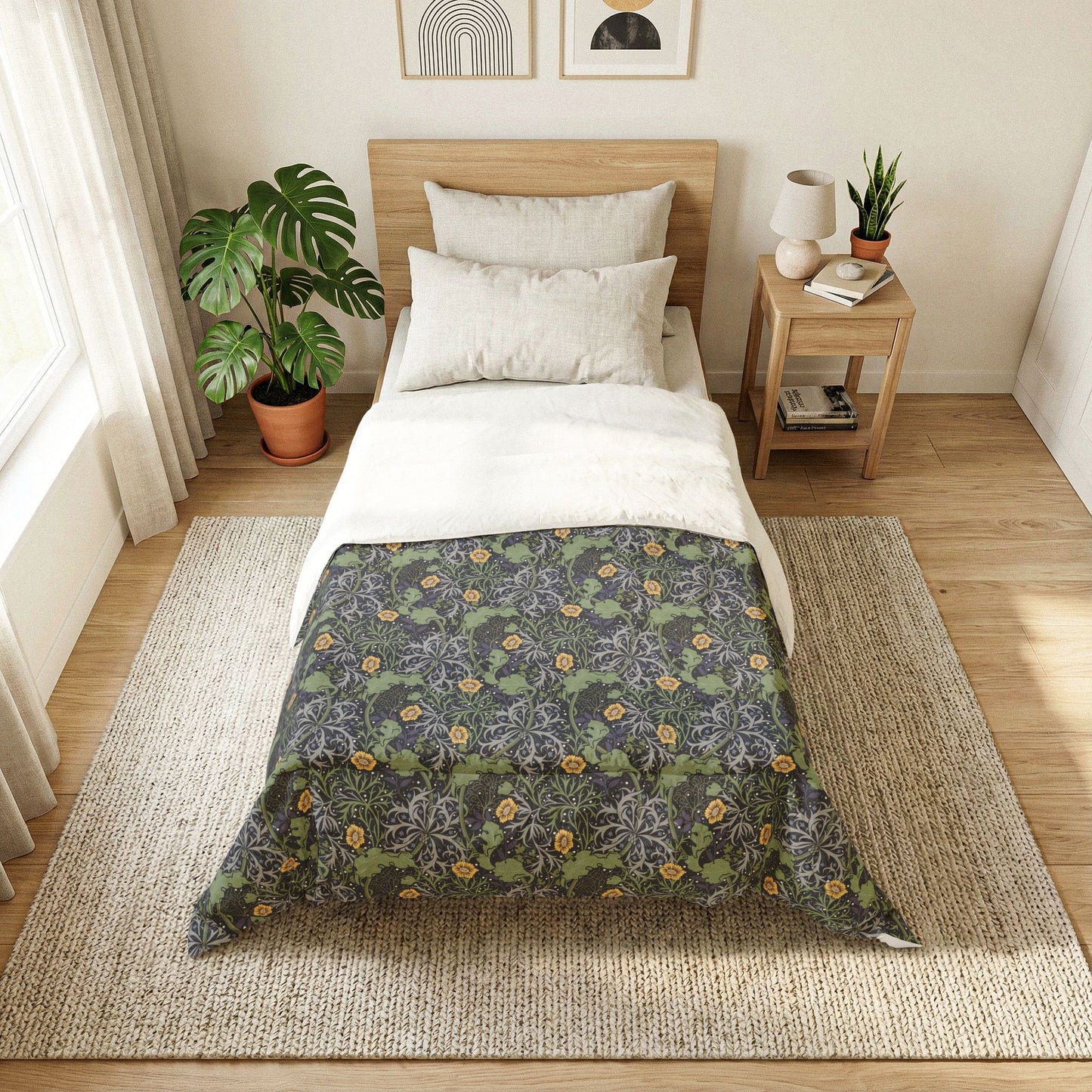Bedroom with floral-patterned comforter on a bed, side table with lamp and books, and plants.