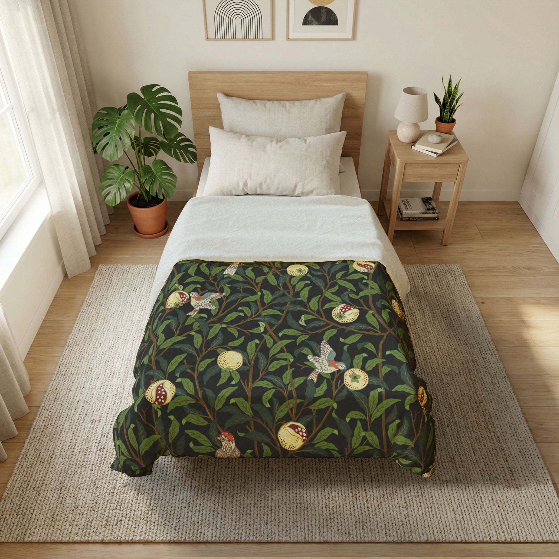 Bedroom with a bed featuring a green floral patterned comforter, wooden nightstand, and plants.