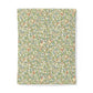 Patterned cotton duvet cover with green leaves and red berries on a white background