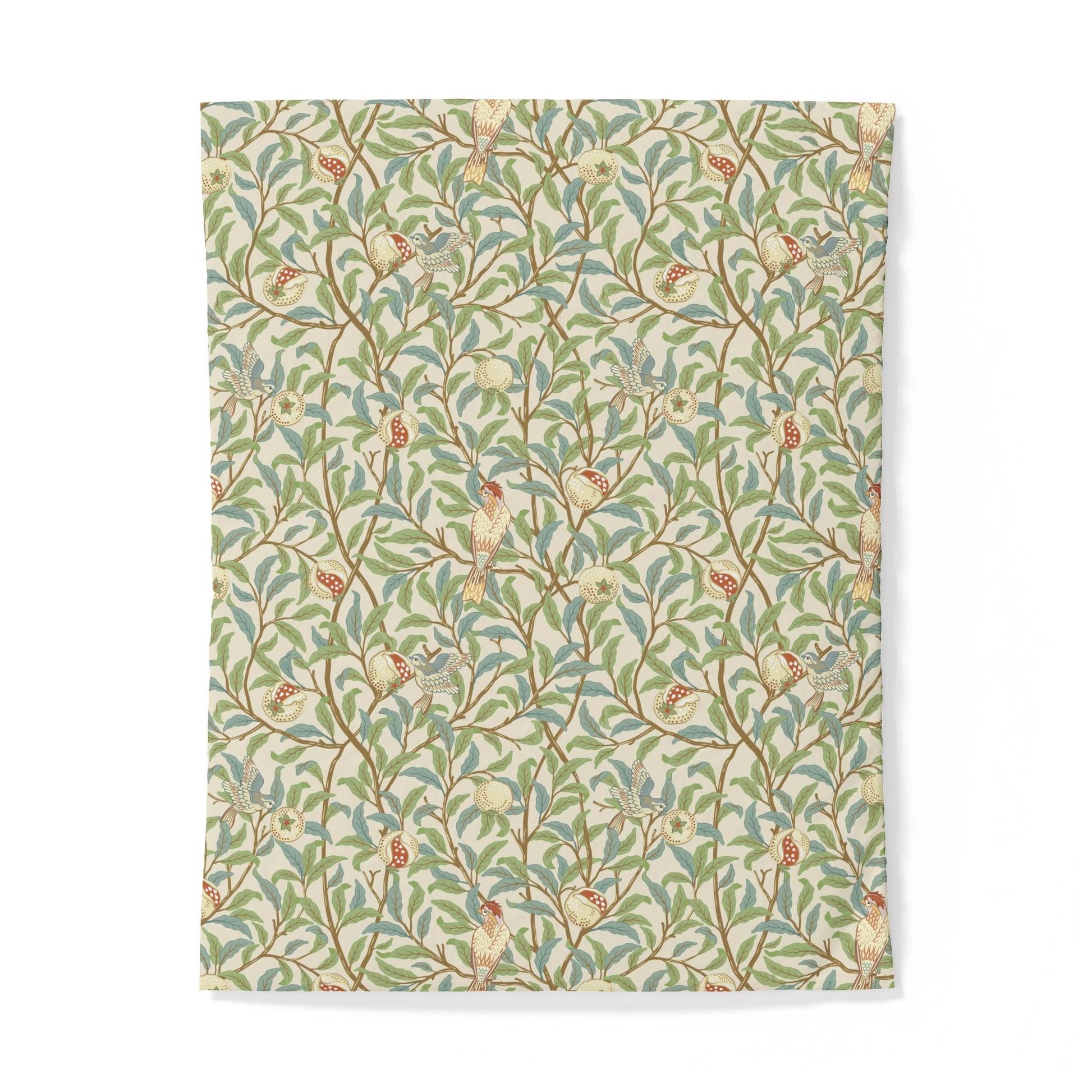 Patterned cotton duvet cover with green leaves and red berries on a white background