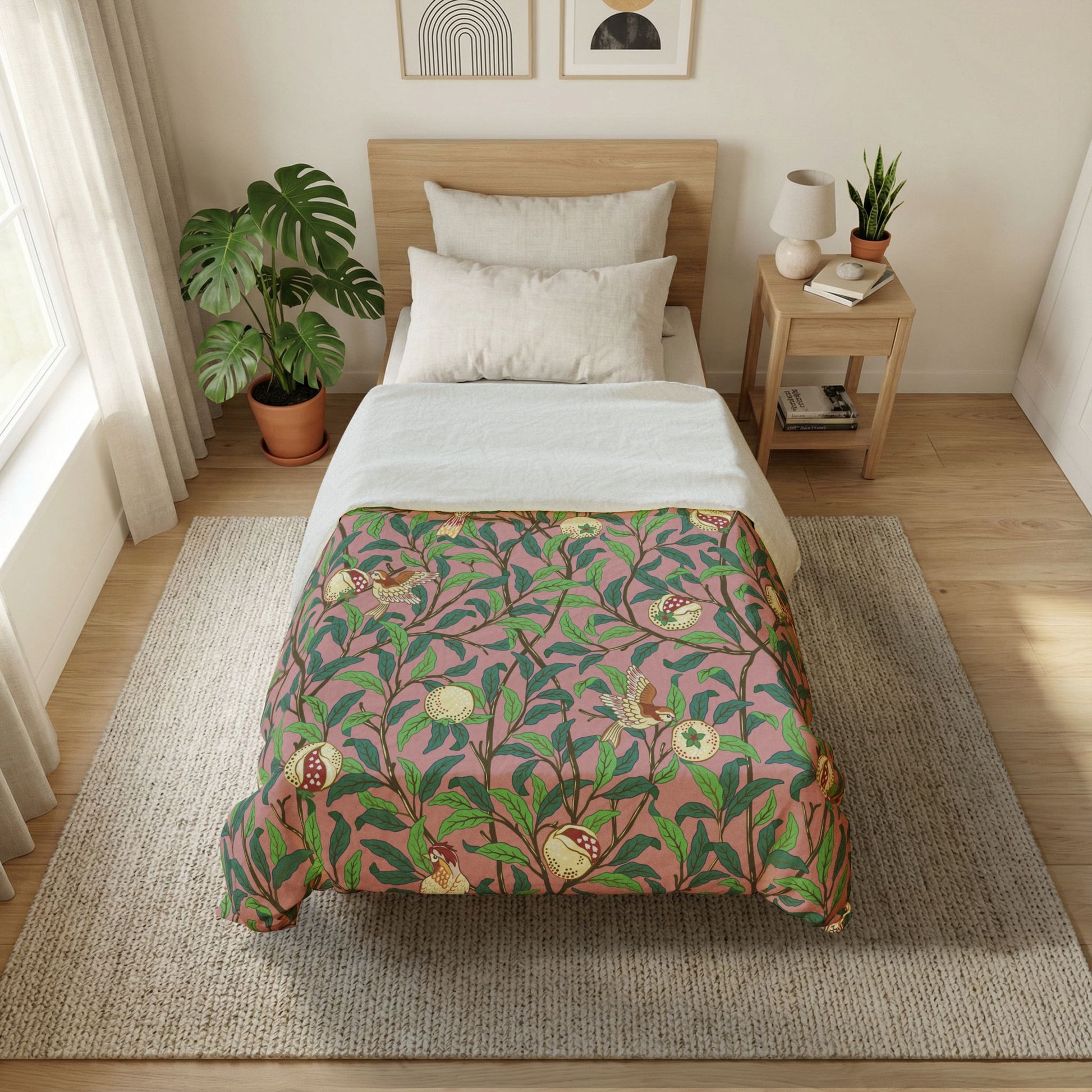 Bedroom with a bed featuring a floral comforter, nightstand, and plants.