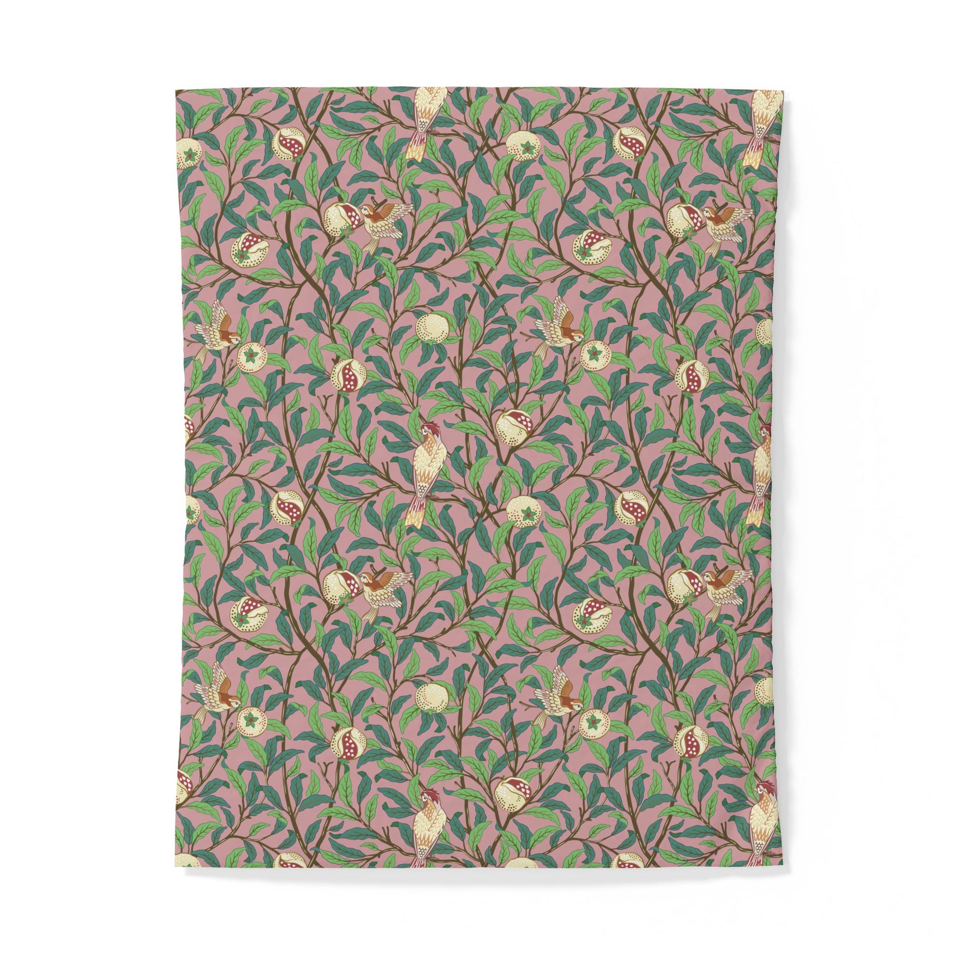 Patterned cotton duvet cover with floral and bird design on a pink background