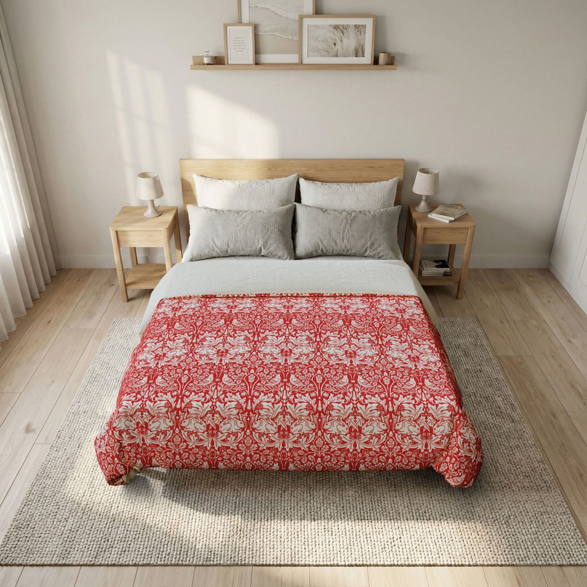 Bedroom with a bed featuring a red and white patterned comforter, wooden headboard, and nightstands.