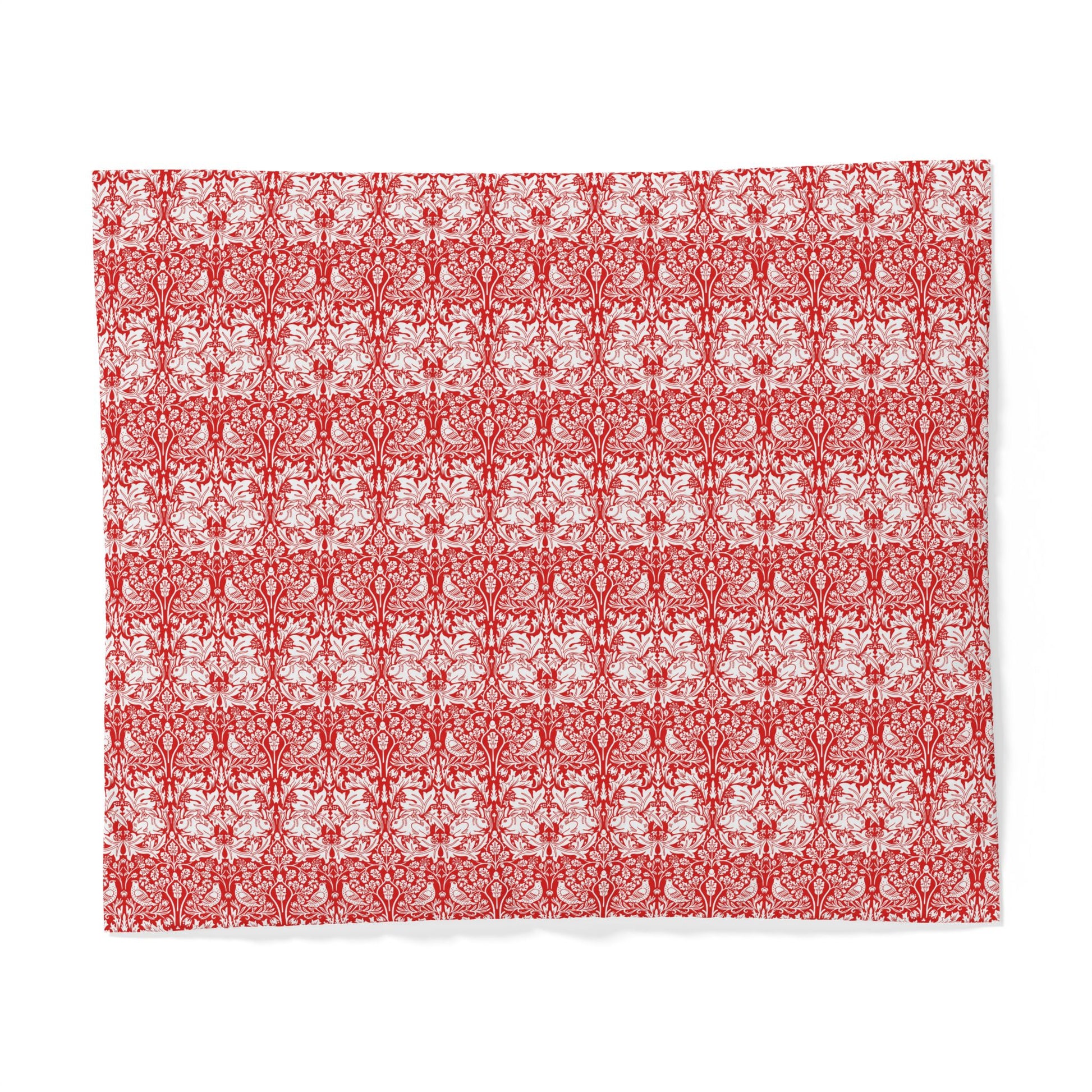 Red and white patterned fabric on a white background