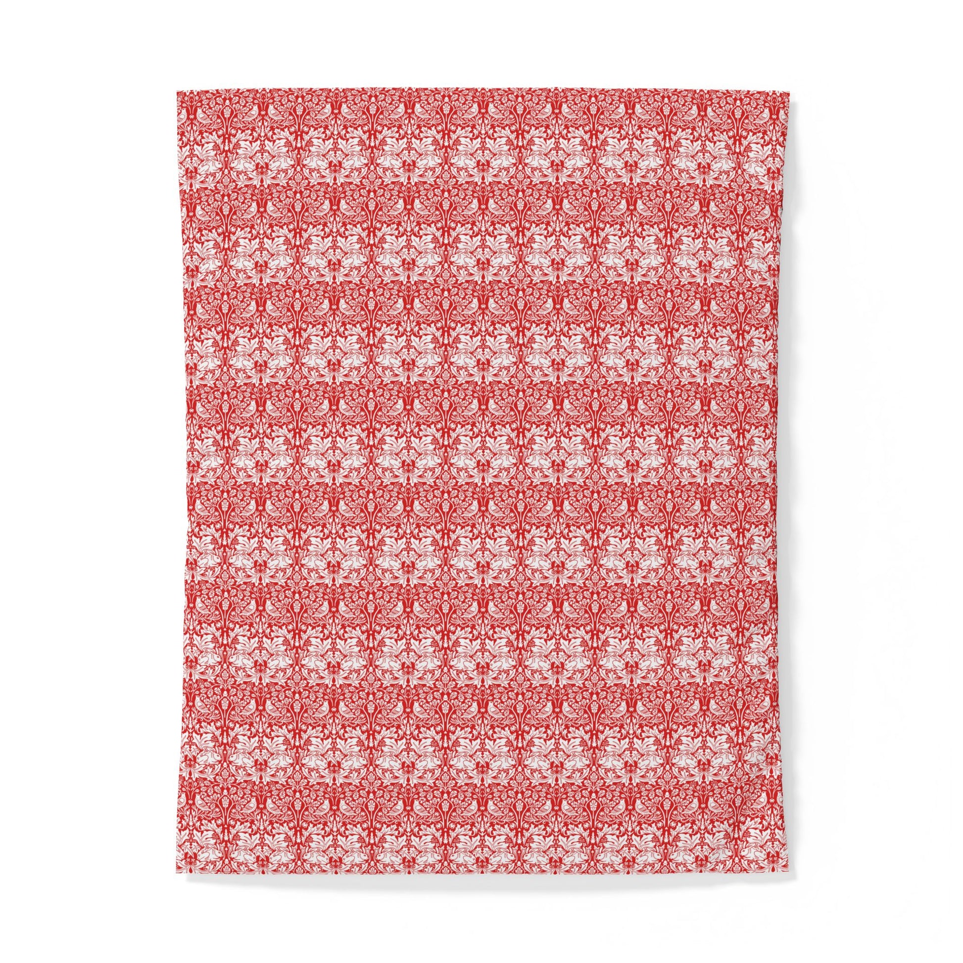 Red and white patterned cotton fabric duvet cover on a white background