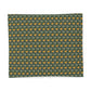 A square fabric item, likely a napkin or small tablecloth, featuring a repeating William Morris-style floral pattern in dark green, sage, and yellow, displayed flat against a white background.