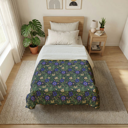 Bedroom with floral bedspread, nightstand, and plants