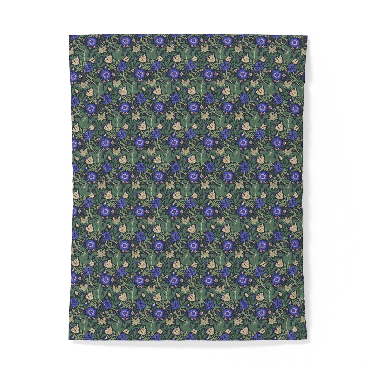 Floral patterned cotton duvet cover with blue flowers on a green background