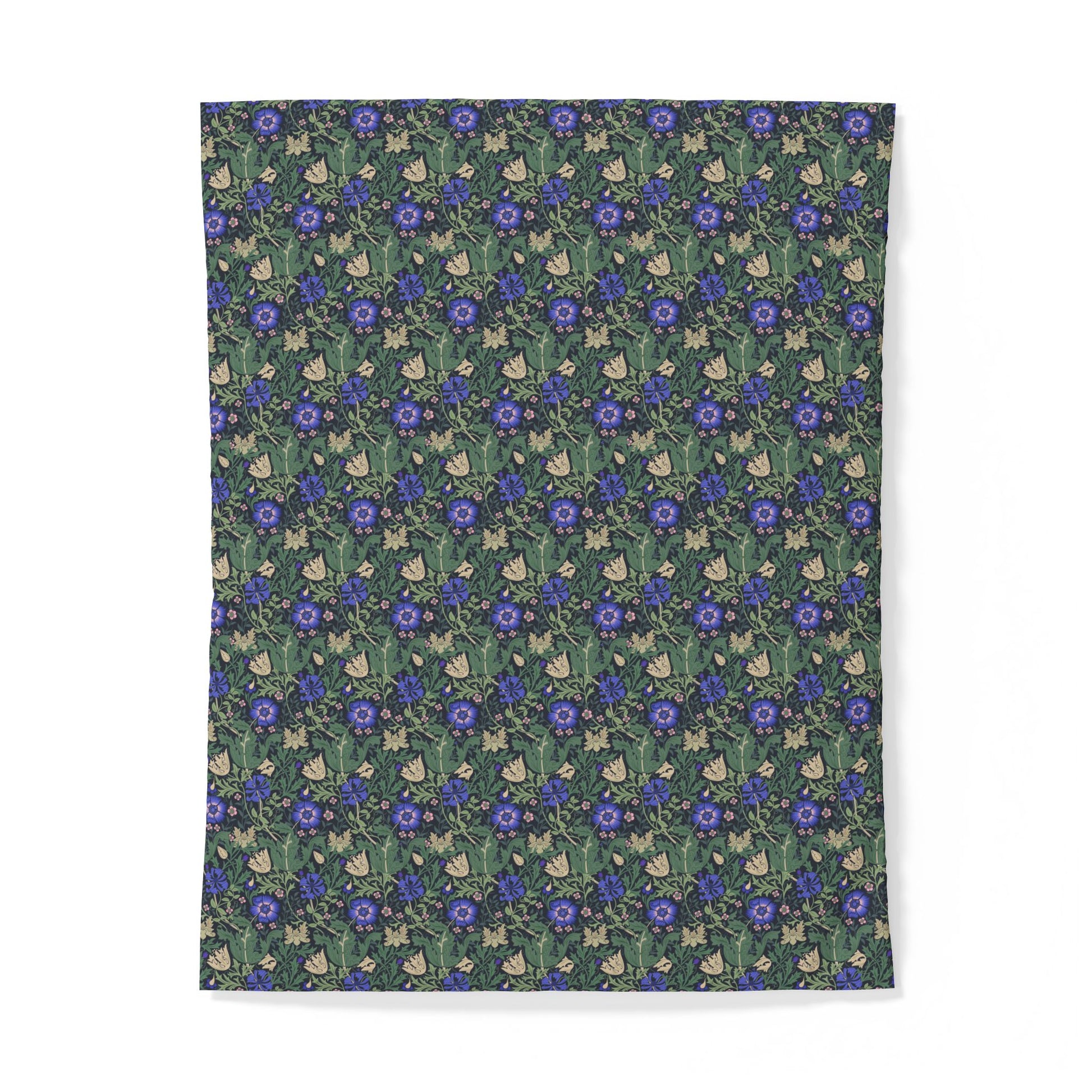 Floral patterned cotton duvet cover with blue flowers on a green background