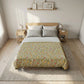 Bedroom with floral-patterned bedspread on a bed, wooden nightstands, and framed pictures on the wall.