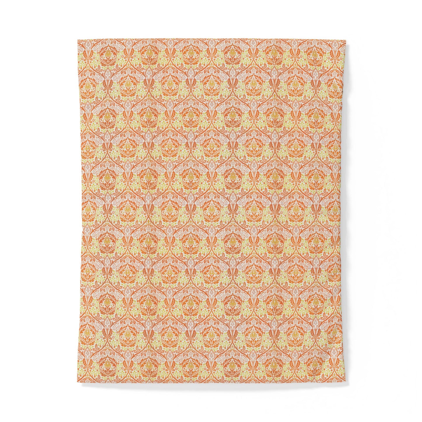 A rectangular textile item, likely a towel or blanket, featuring a repeating ornate damask-style pattern in warm orange, peach, and pale yellow tones on a light background.