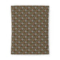 A rectangular fabric item, likely a blanket or towel, featuring a dense vintage floral pattern in olive green, rust red, and white, shown flat against a white background.